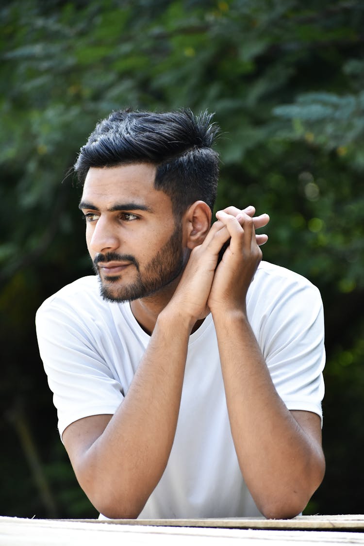 Portrait Of A Young Handsome Man In White Shirt