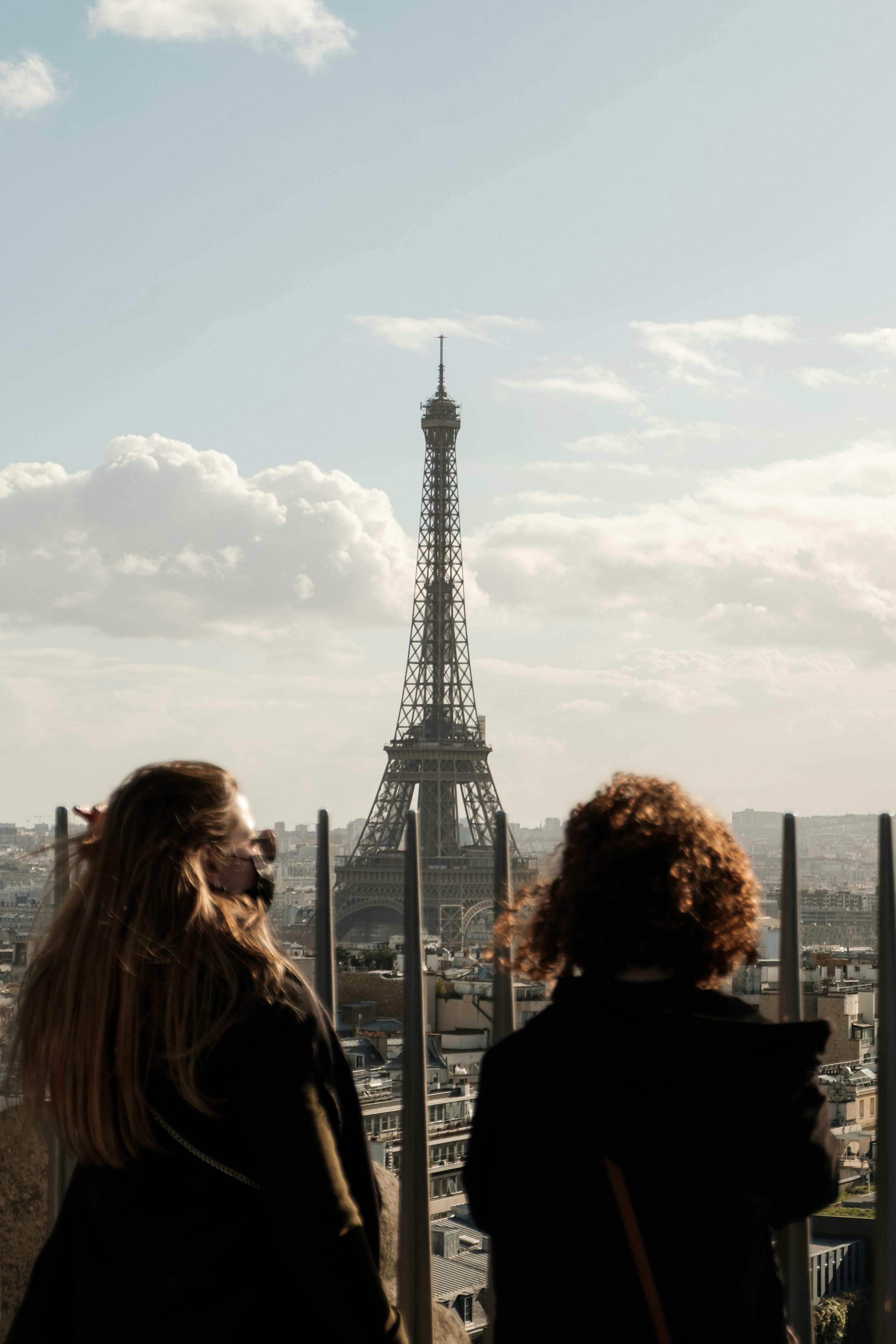 Woman in Red Long Sleeve Shirt Standing Near Eiffel Tower · Free Stock ...