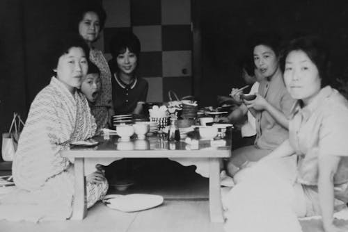 Japanese Family Eating A Meal