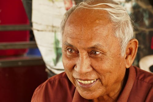 Free A Close-up Shot of an Elderly Man Smiling Stock Photo