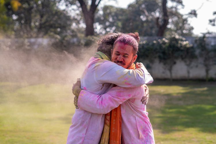 Men Celebrating The Indian Festival Of Colors