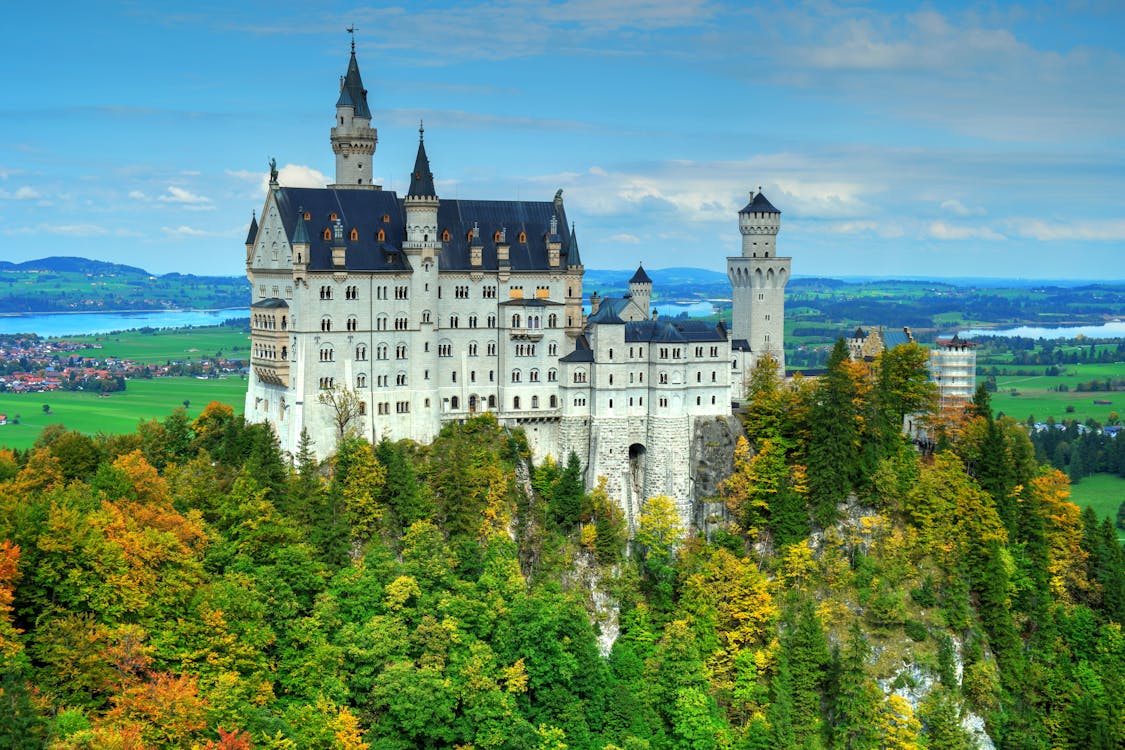 Free The Neuschwanstein  Castle on the Hilltop in Schwangau Germany Stock Photo