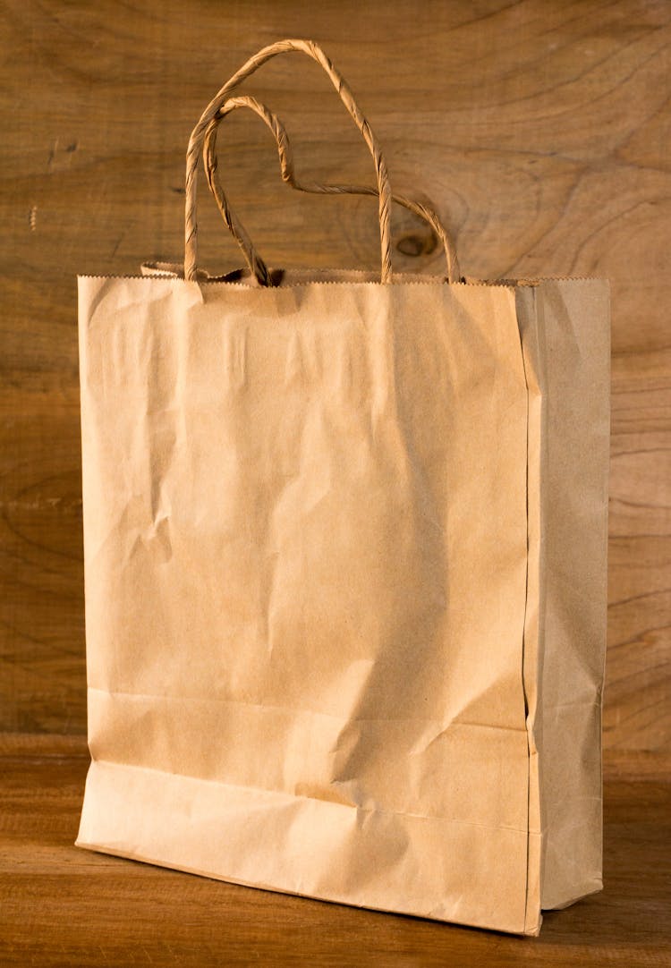 Craft Shopping Bag On Wooden Background