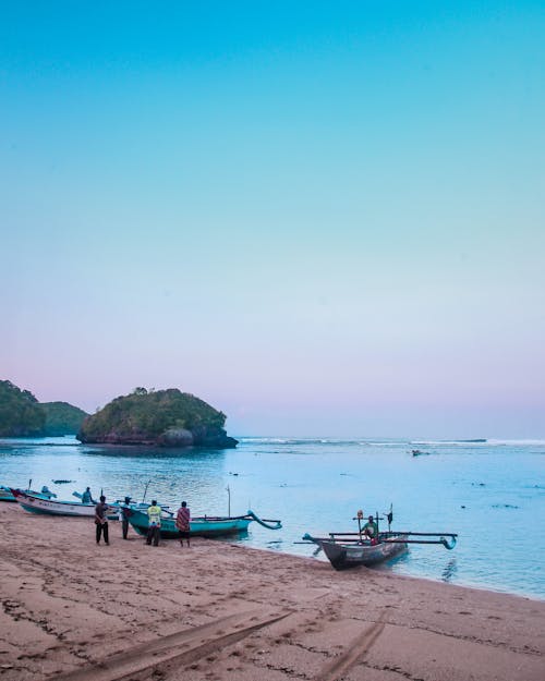 People Standing on Shore