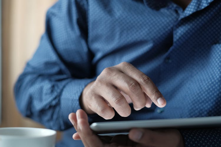 Man Using A Digital Tablet 