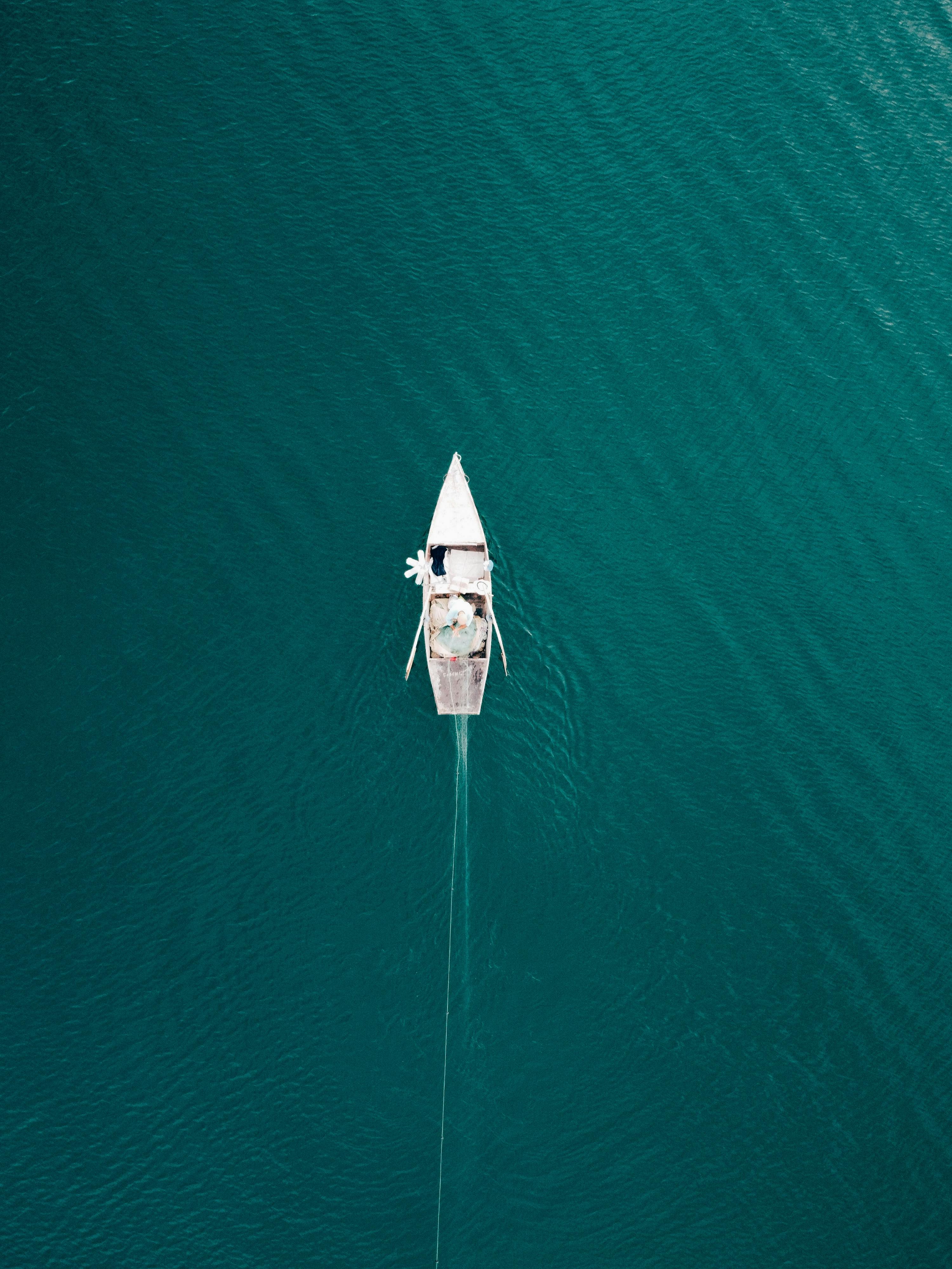 White and Blue Boats on Blue Sea · Free Stock Photo