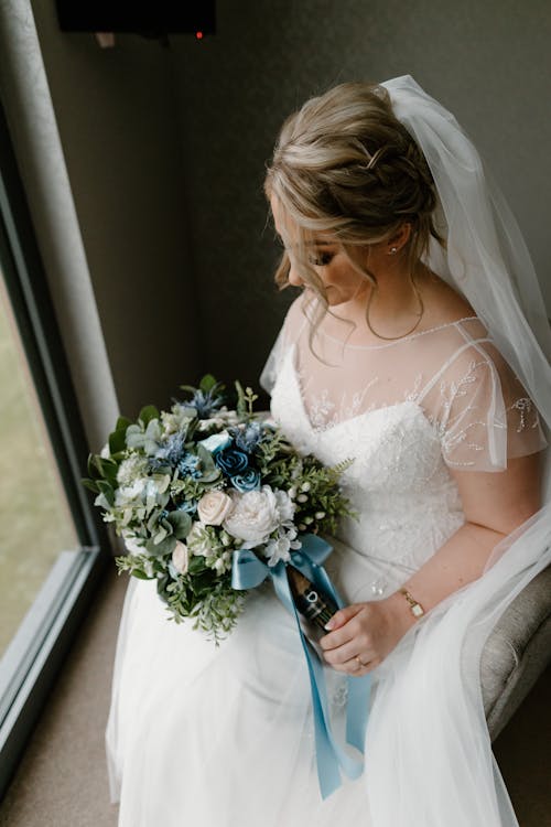 A Beautiful Bride Holding Her Bouquet