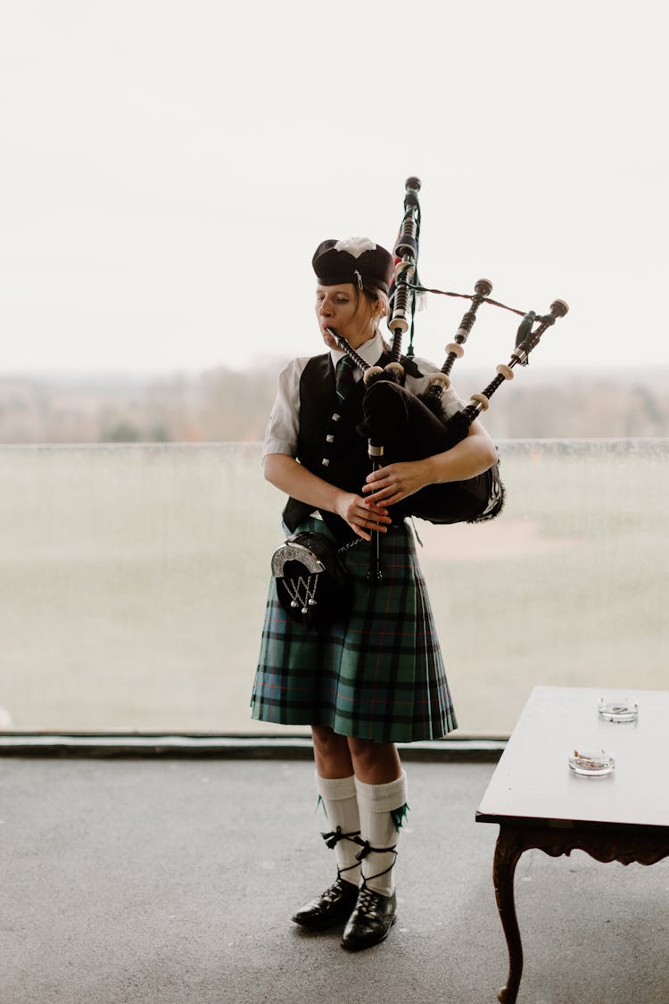 Scottish Piper Playing Bagpipes