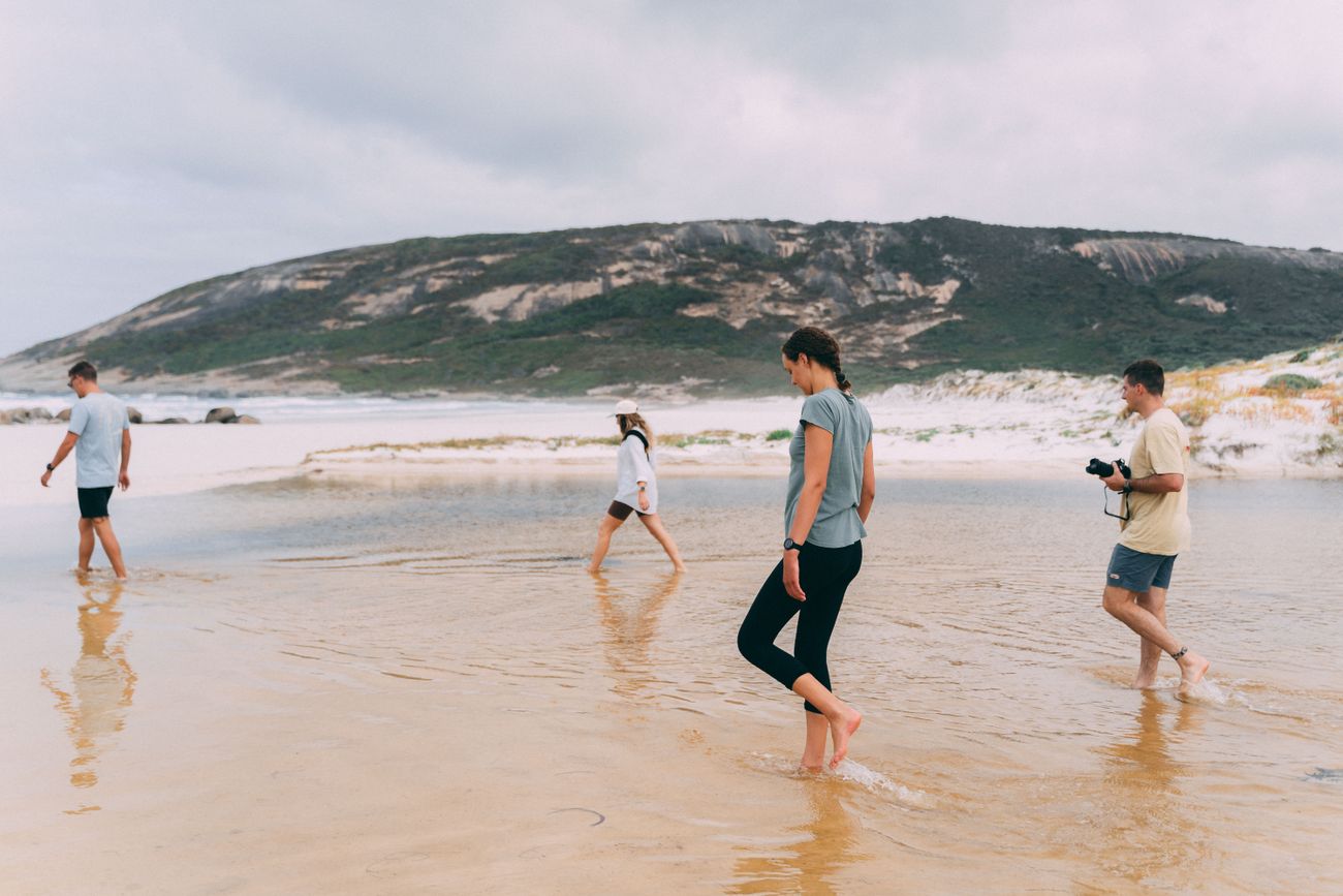 A group walking a coastal trail together — Liam Moore on Pexels