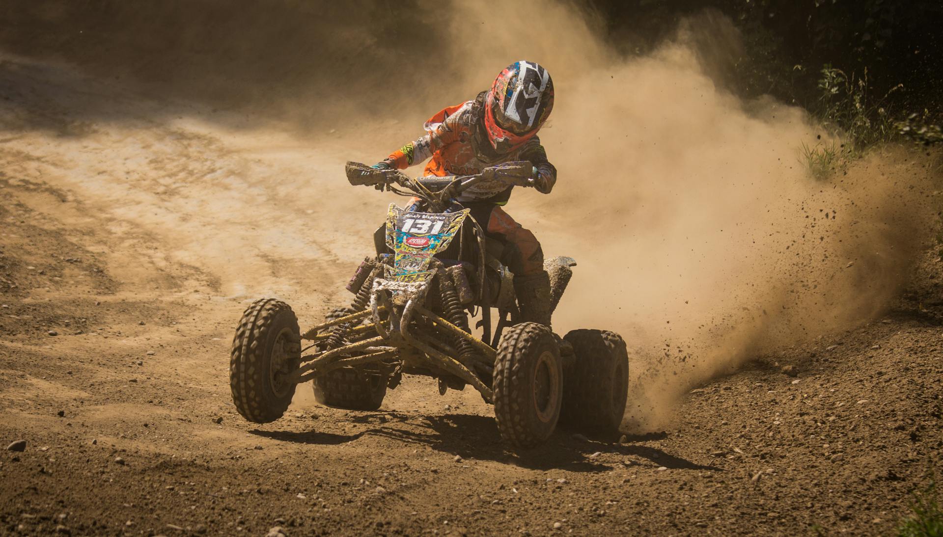 Person Riding on Black Atv Quad Bike