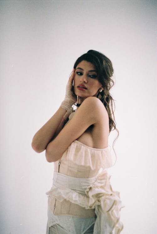 Woman in White Ruffled Dress