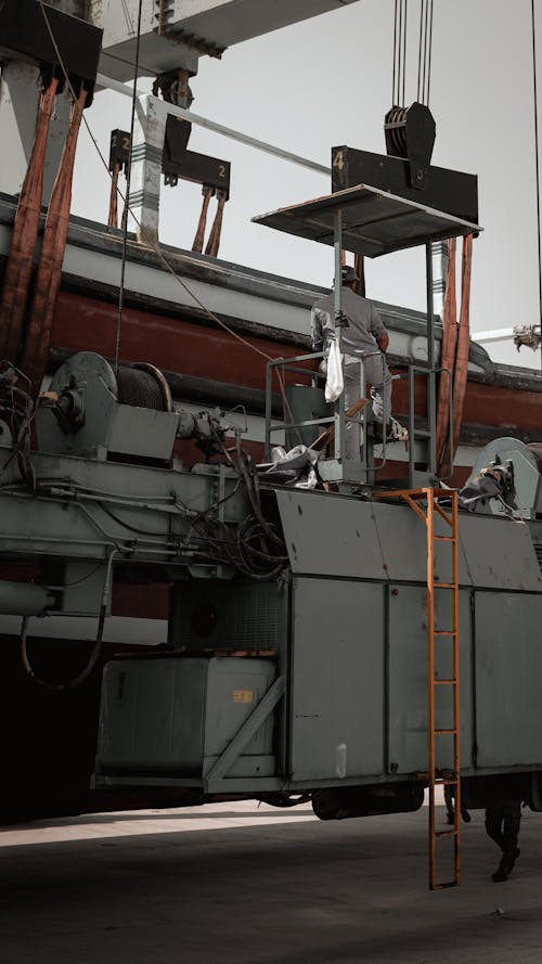 Manual Workers in a Heavy Equipment 