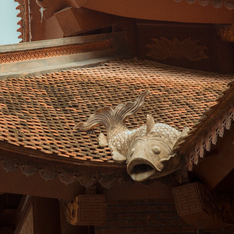 Carved Fish On Roof Ridge