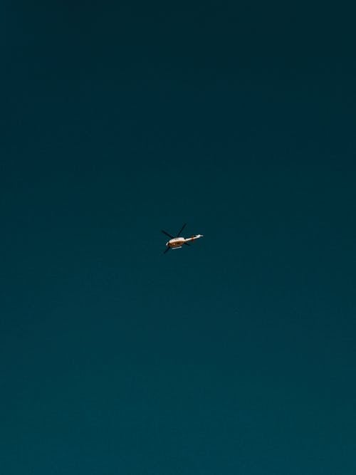 Gratis Foto stok gratis heli, langit biru, pesawat terbang Foto Stok