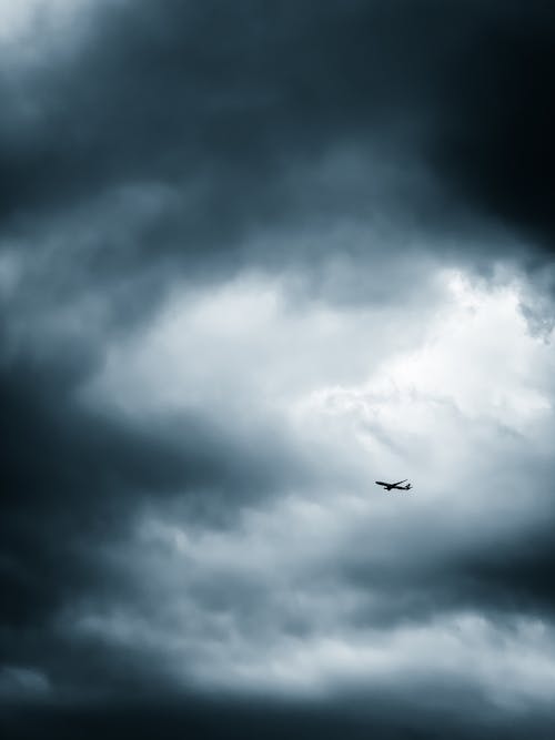 Free An Airplane in the Sky Stock Photo