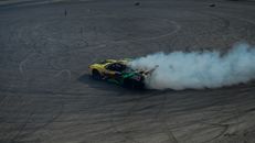 High Angle Shot of Drifting Car
