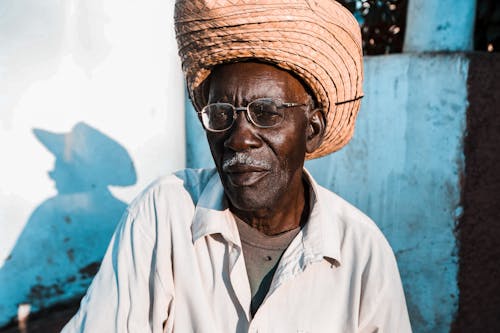 Free An Elderly Man Wearing a Hat and Eyeglasses Stock Photo