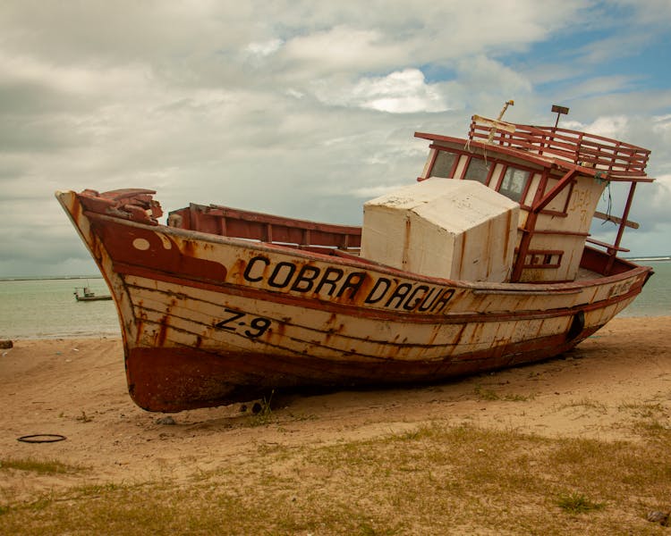 Broken Boat At Playa De Los Pescadores In Uruguay