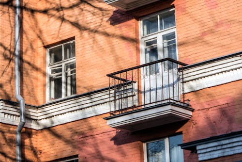 Black Metal Railings on Brown Concrete Building