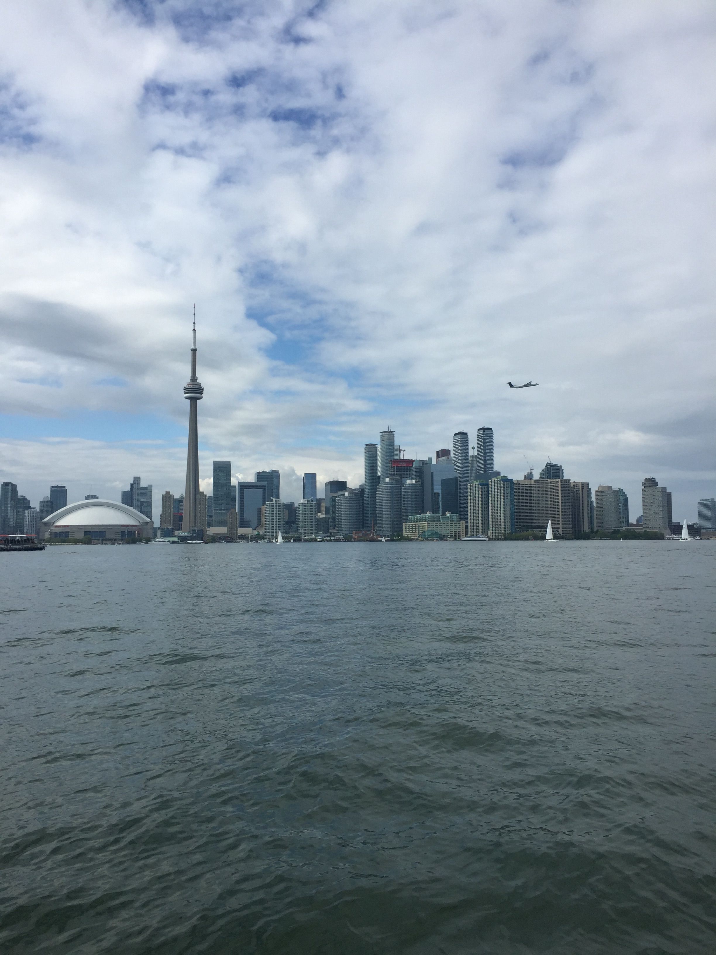 City Skyline Under White Clouds and Blue Sky · Free Stock Photo