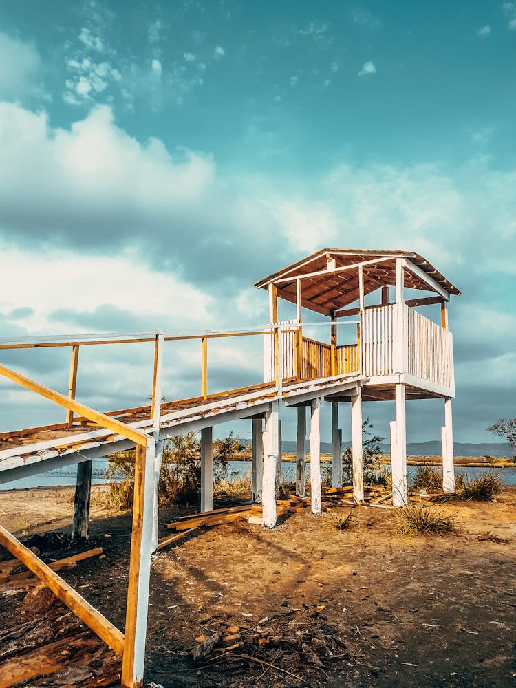 A Wooden Structure By A Lake