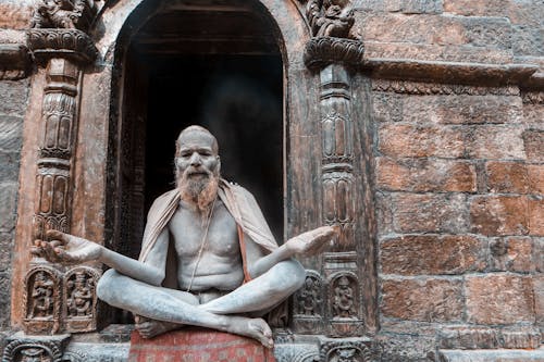 A Monk Sitting Cross-Legged
