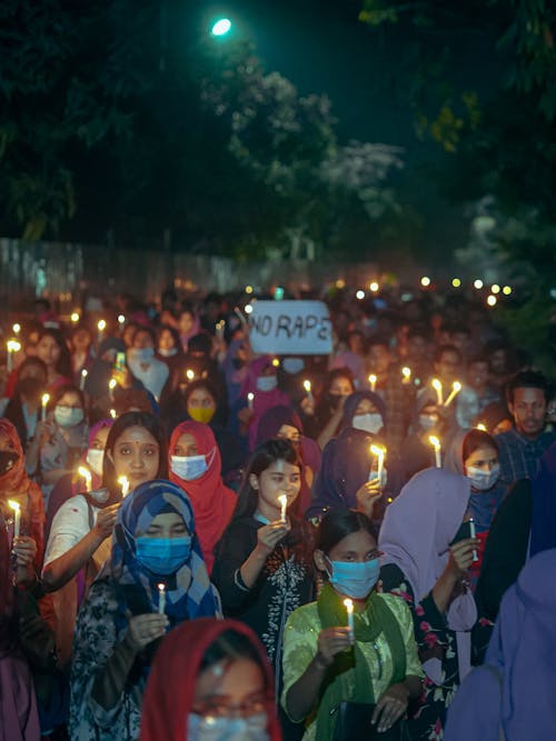 Crowd on a Protest Holding Burning Candles 