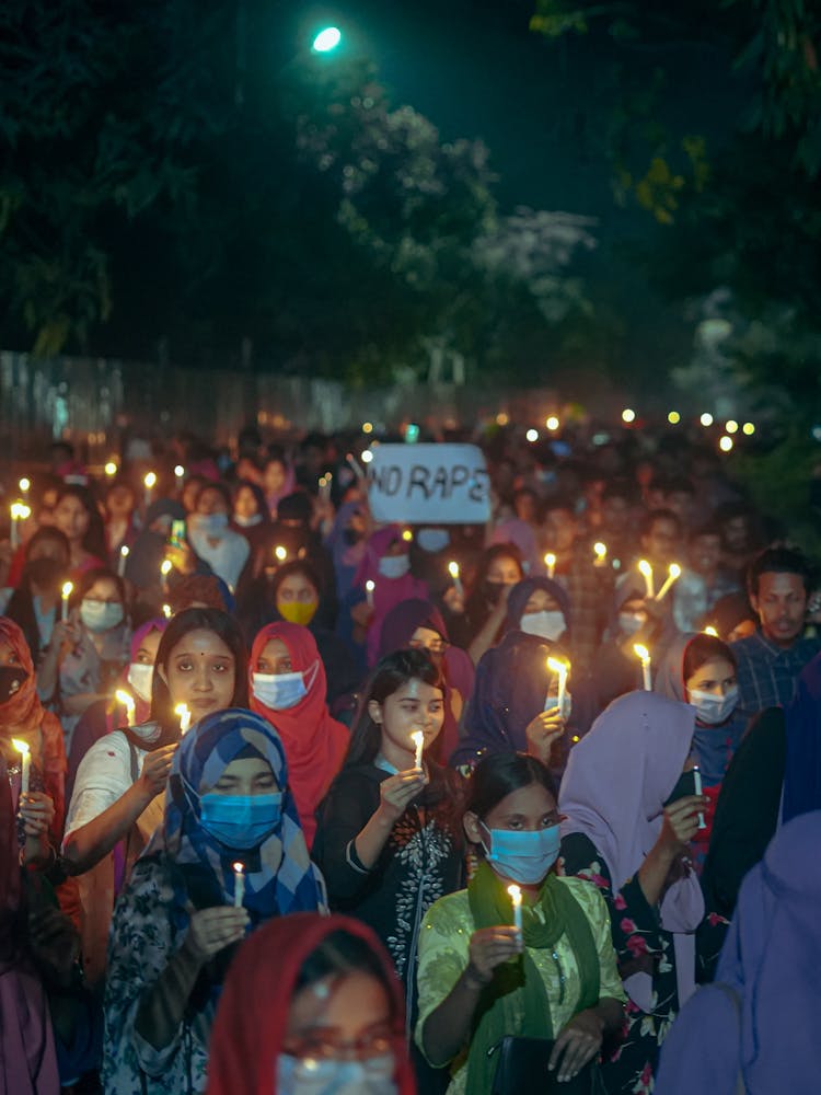 Crowd On A Protest Holding Burning Candles 