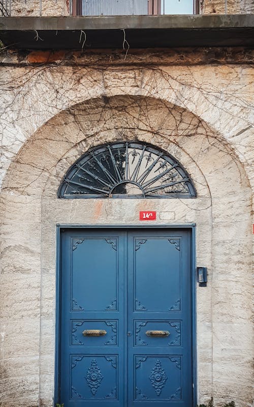 Blue Door in a Arched Entrance