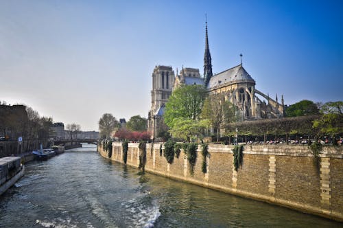 Free The Notre-Dame de Paris as Seen from the Seine River Stock Photo