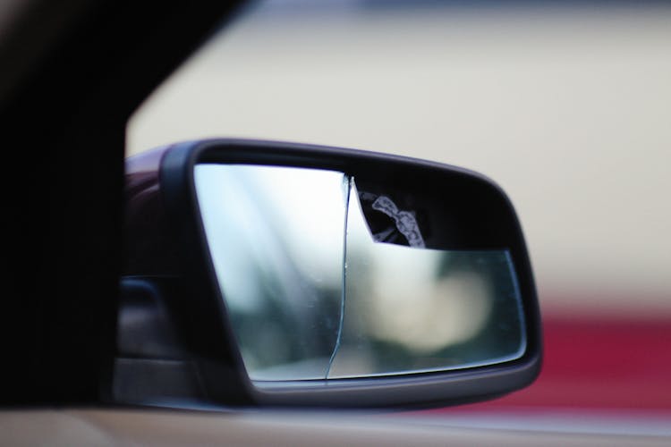 Close-up Of A Broken Side Mirror 