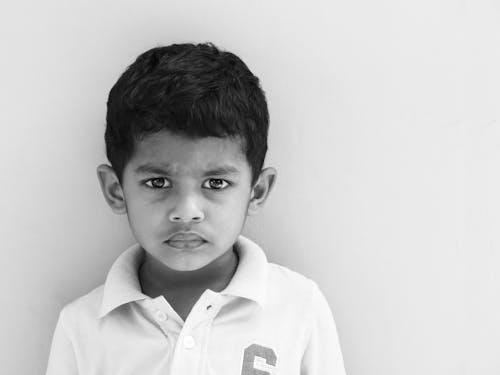 Grayscale Photo of Boy