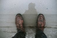 Person in Black Pants and Brown Leather Shoes