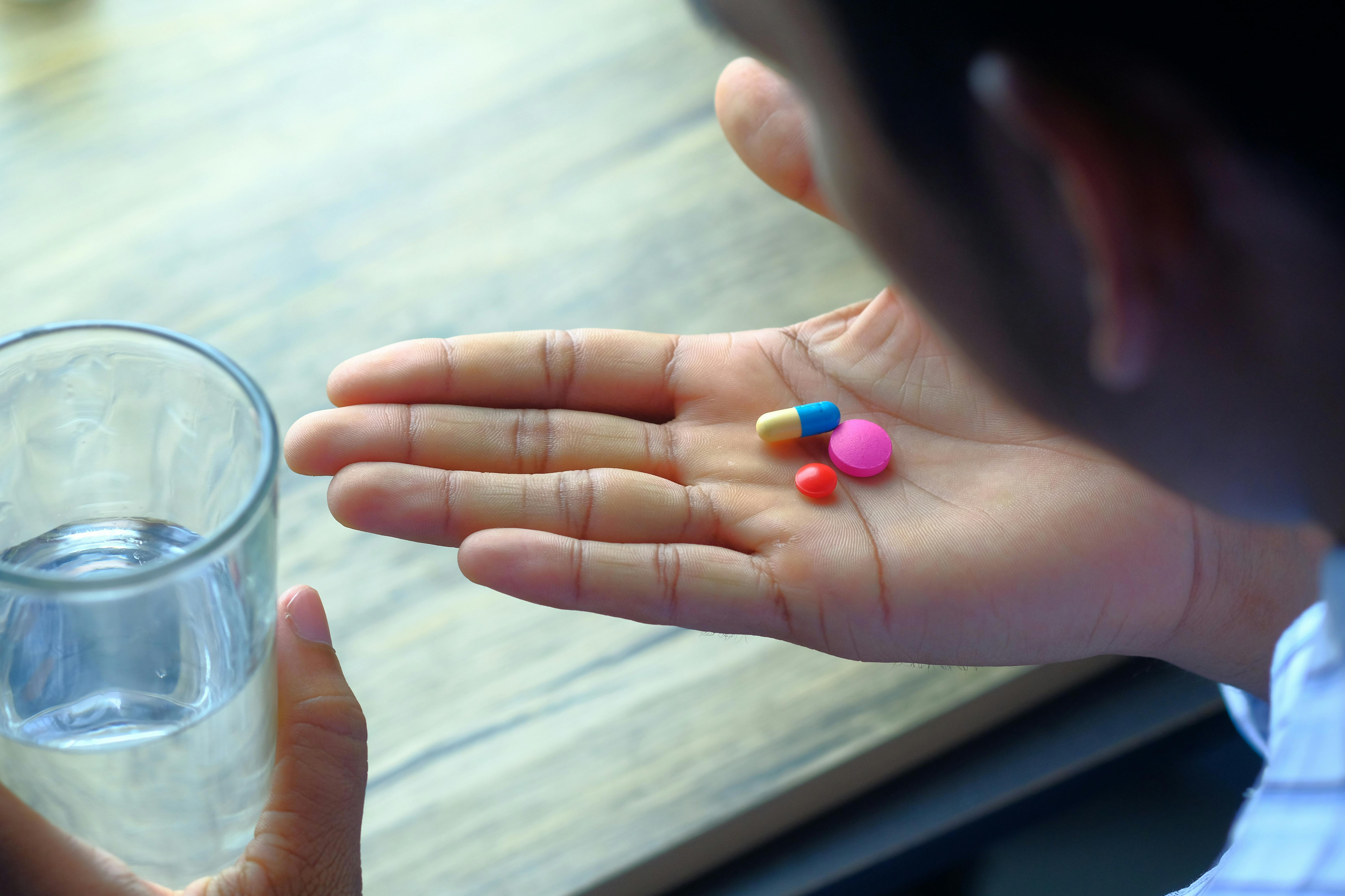 Man Taking Pills Free Stock Photo Pexels Photo 11363786