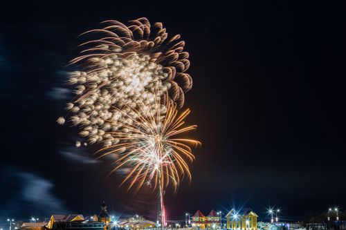 Free Brilliant fireworks explode in Kamchatka, Russia illuminating the night sky with vibrant colors. Stock Photo