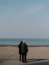 Couple Admiring Calm Sea