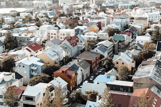 Aerial photograph showcasing colorful rooftops in Reykjavik's residential district.