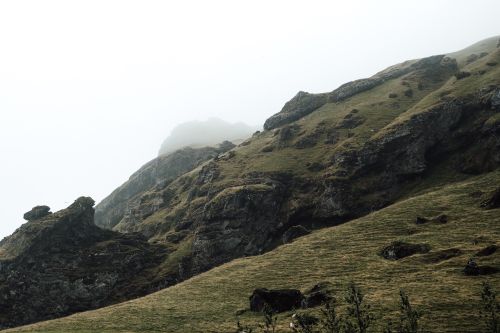 Free A tranquil scene of a foggy mountainside in Iceland, showcasing natural beauty and mystery. Stock Photo