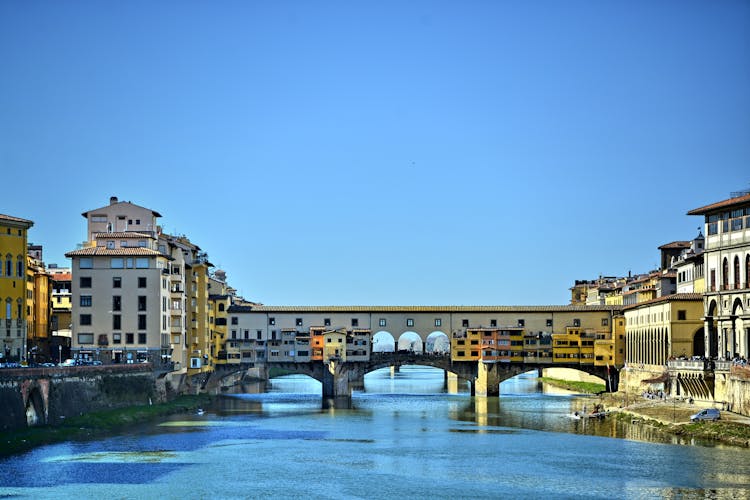 The Old Bridge Across Arno River In Florence, Italy