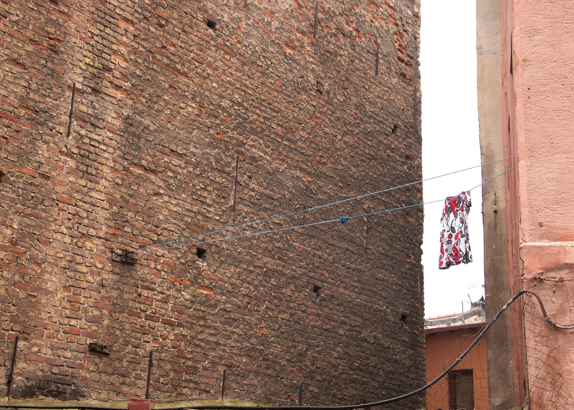 String Mounted in a Brick wall