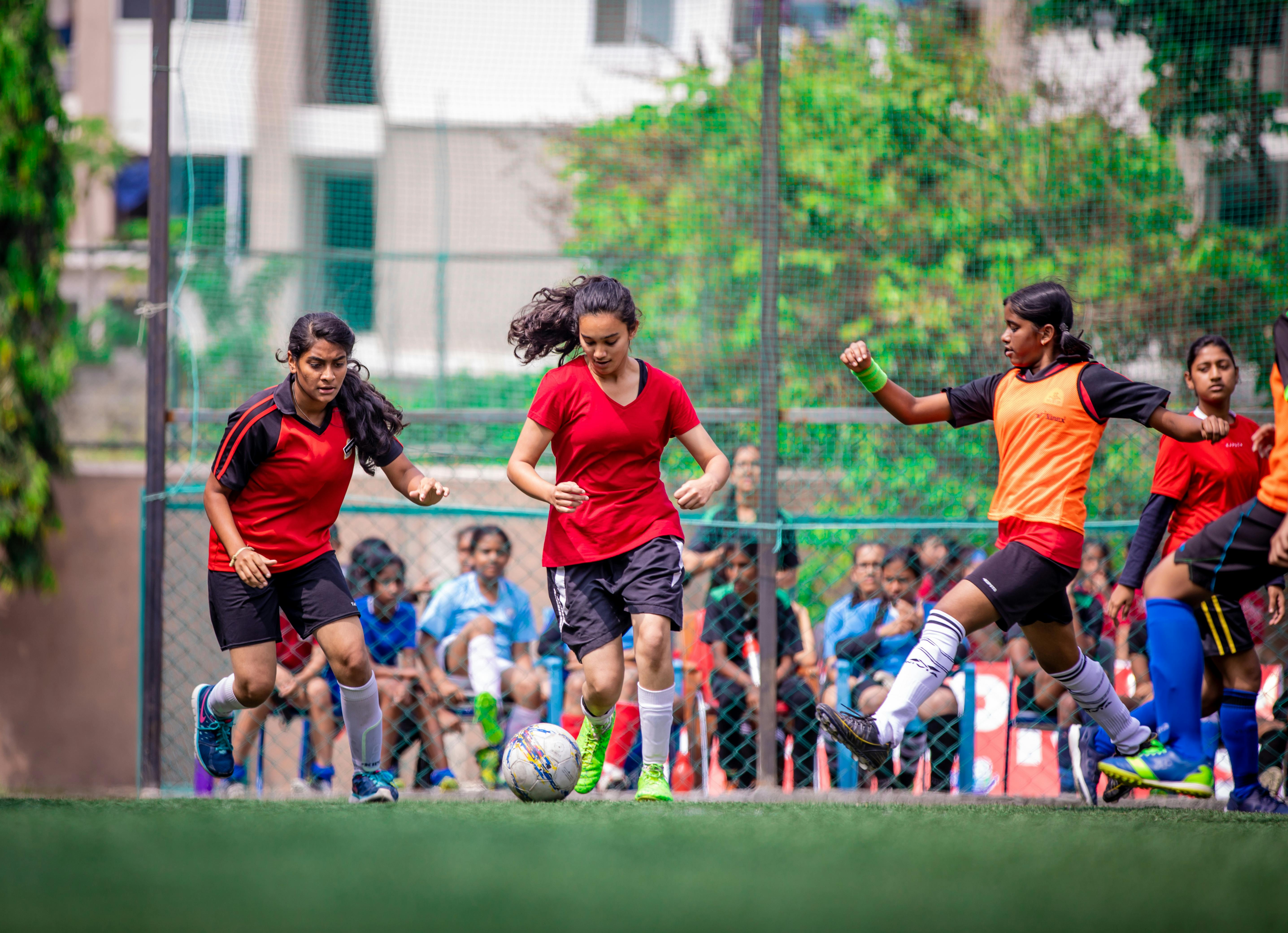 girls playing football