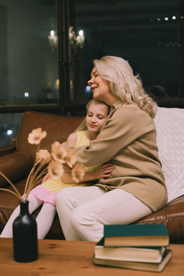 A Woman Hugging Her Granddaughter