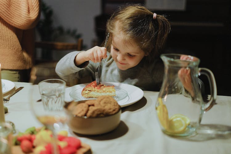 Girl Eating Homemade Pie