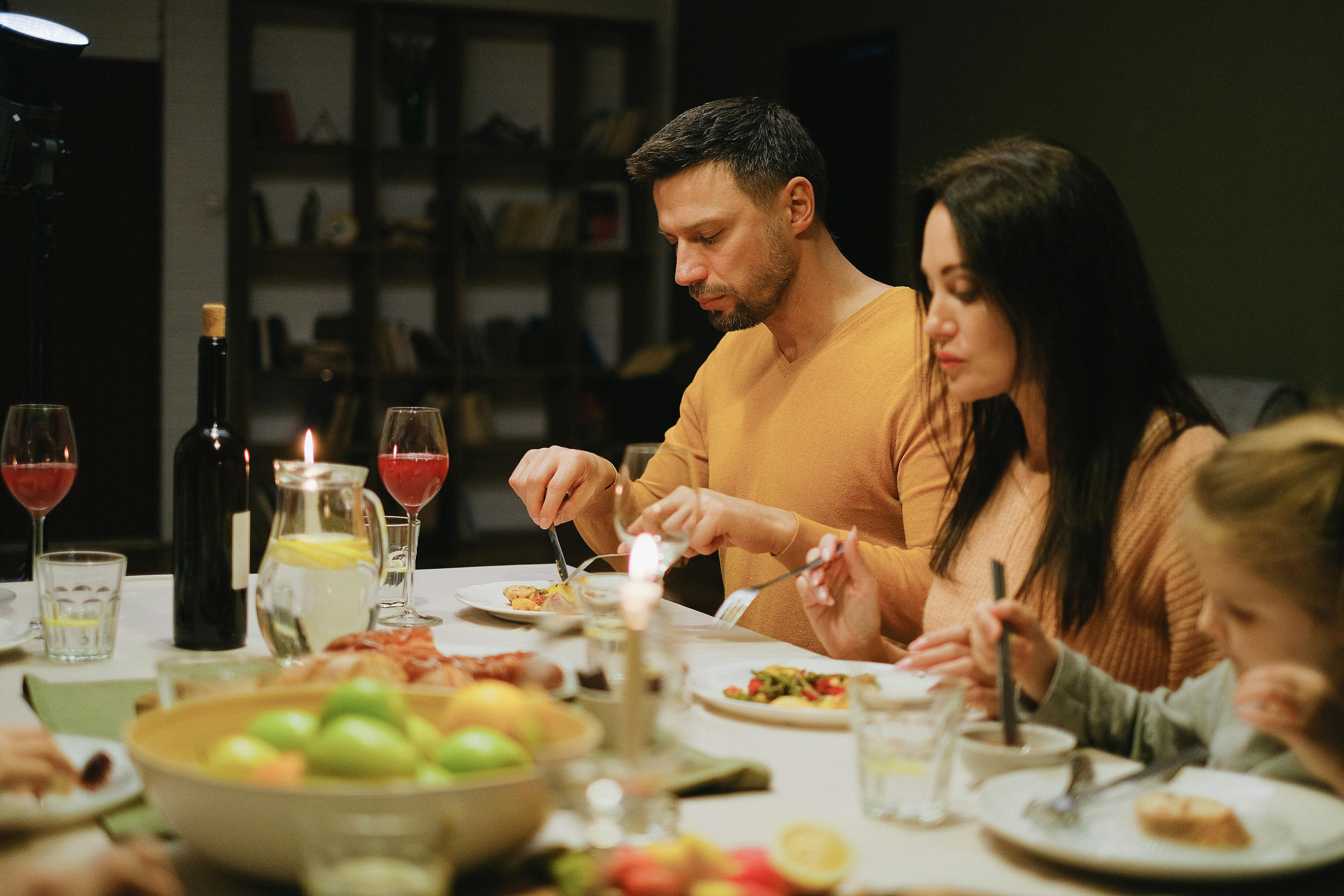 a family having dinner at a table