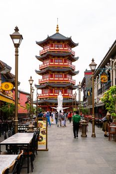 Vibrant pagoda in Pantjoran PIK, Jakarta – a colorful tourist hotspot amid lively streets. - Fotografer Sidoarjo