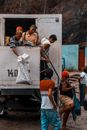 People Walking Out of a Truck