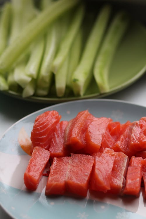 Free Sliced Raw Tuna on Ceramic Plate Stock Photo
