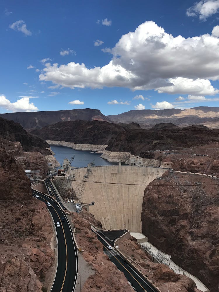 Hoover Dam Under Blue Sky And White Clouds