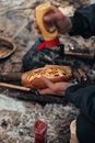 Person Holding Bread With Ham