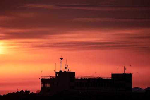 Základová fotografie zdarma na téma budova, rozbřesk, silueta